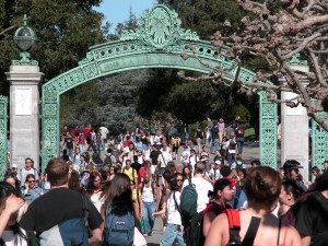 Students pass beneath Sather Gate and onto Sproul Plaza at UC Berkeley